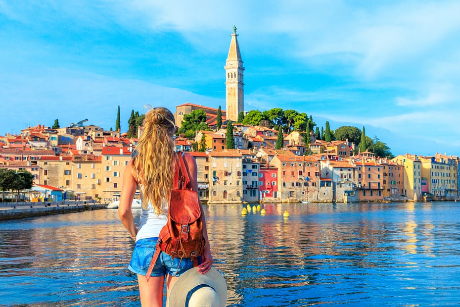 Woman looking over town in the Croatia